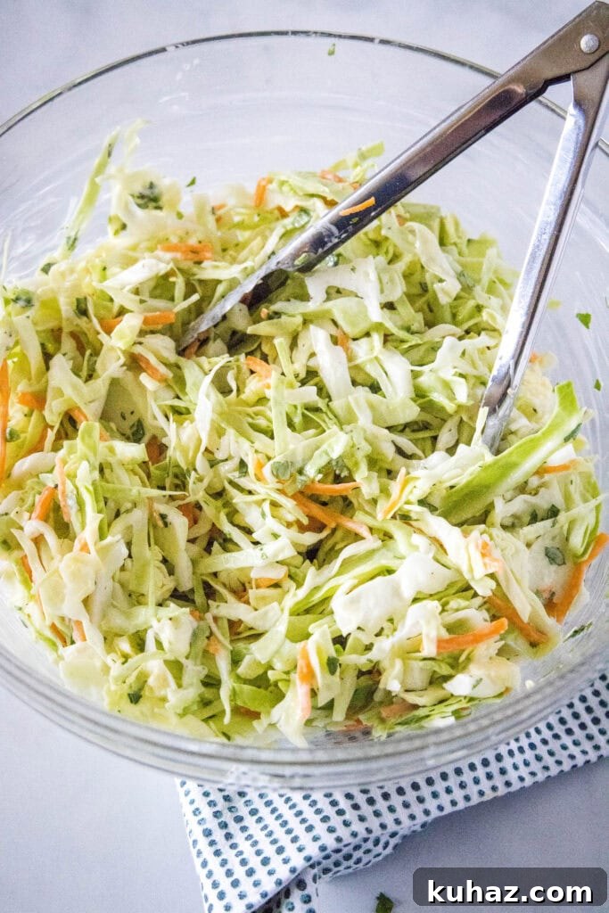 Zesty Mexican Coleslaw with Lime and Cilantro 5 mexican coleslaw in a mixing bowl