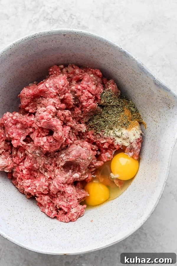 Oven Baked Meatballs Ingredients All of the meatball ingredients in a mixing bowl.