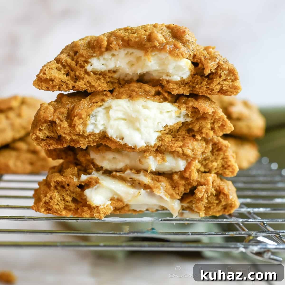 No Bake Pecan Pie Dip with Cream Cheese 10 stack of pumpkin cheesecake cookies cut in half, showing cream cheese filling.