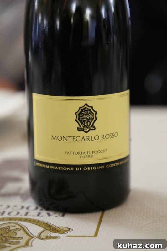Tuscany Wine Tasting Shore Excursion from Cruise Ports 7 Montecarlo Rosso Fattoria il Poggio wine bottle