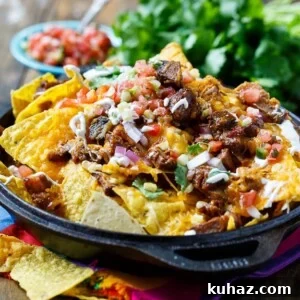 Loaded BBQ Brisket Nachos with Cheese 8 BBQ Brisket Nachos- perfect for game day and a great way to use up leftover brisket.