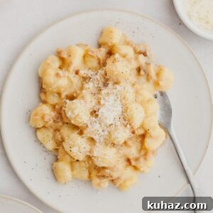 Gnocchi carbonara on a white plate.