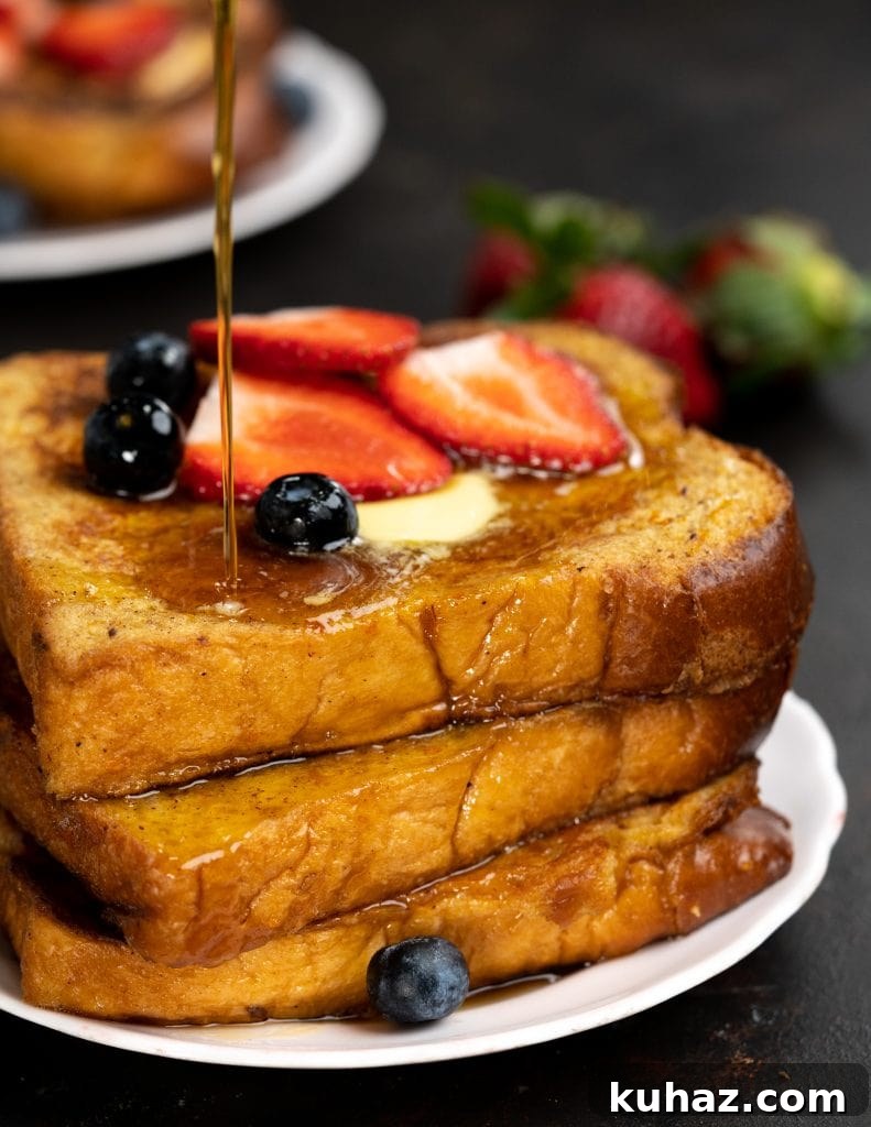 Make-Ahead Ham and Cheese Croissant Breakfast Casserole 16 Brioche French Toast with maple syrup and berries