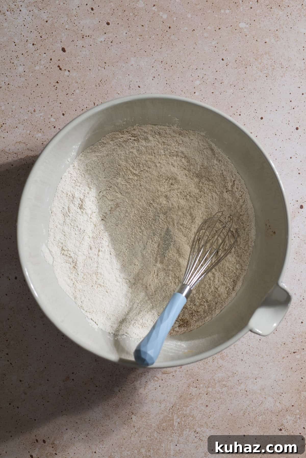 Crispy Sourdough Sweet Potato Waffles 5 Dry ingredients mixed together in a white bowl.