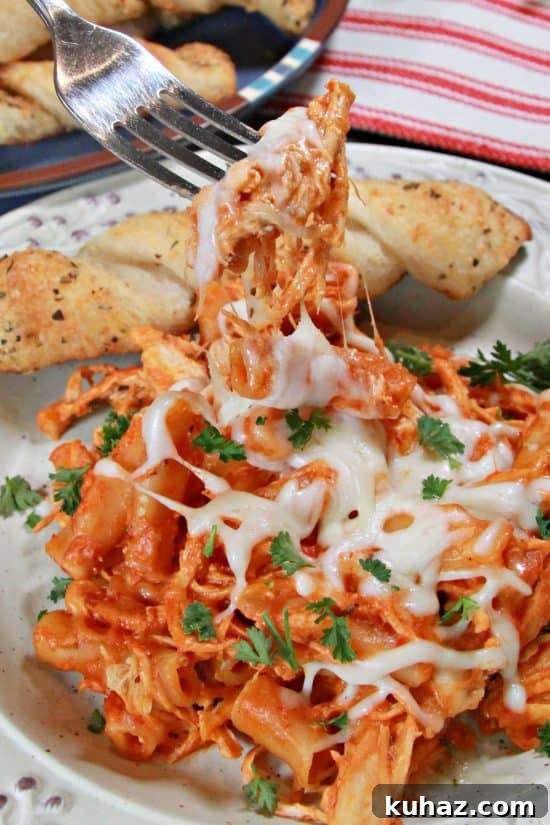 Slow Cooker Chicken Pasta in Savory Tomato Sauce 3 Tender, fall apart chicken is cooked in a delicious Italian sauce.