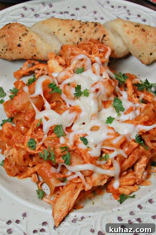 Slow Cooker Chicken Pasta in Savory Tomato Sauce 5 Slow Cooker Saucy Chicken and Pasta is slow cooked to perfection every time.
