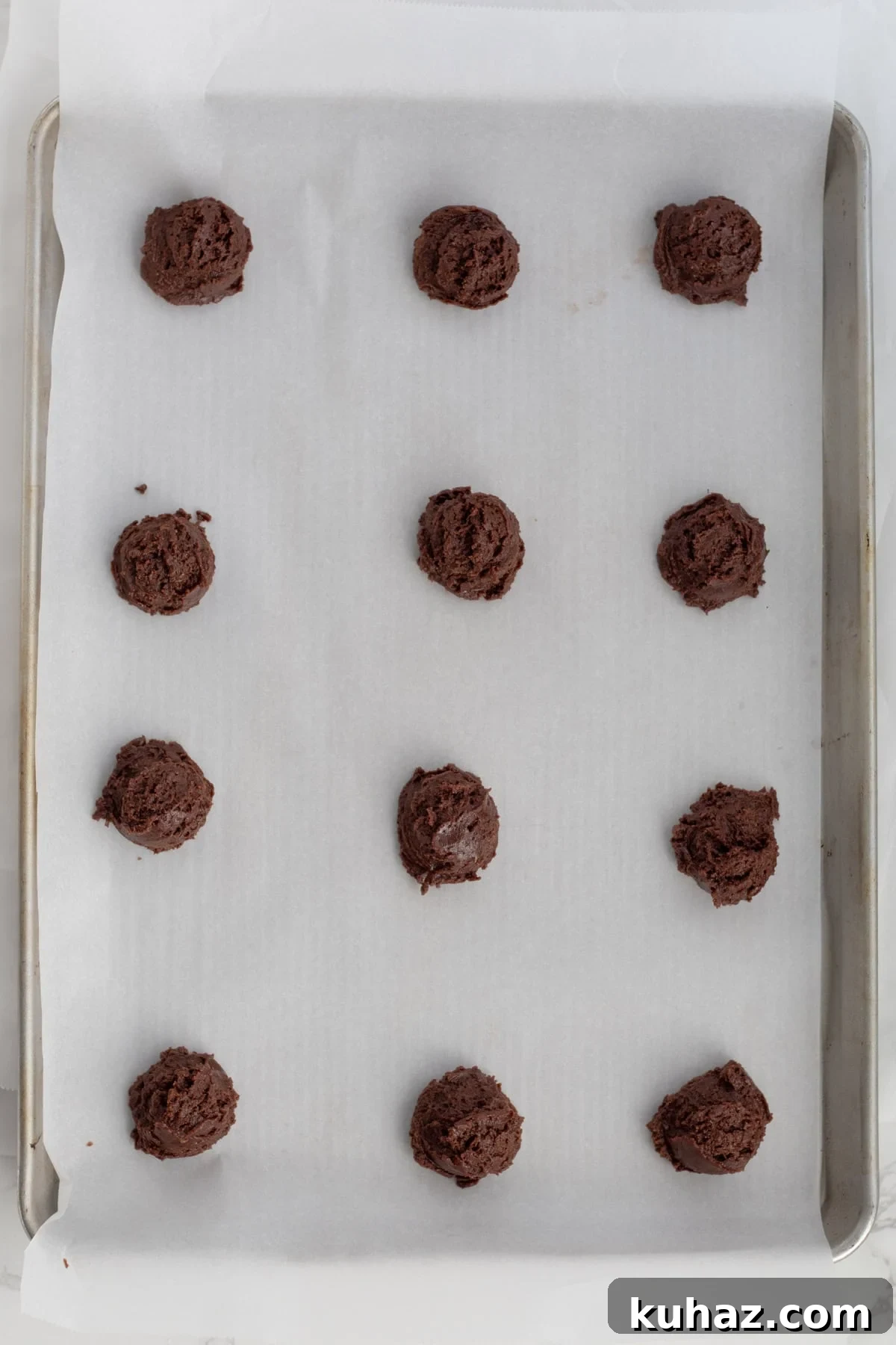 Chewy 4-Ingredient Brownie Mix Cookies 8 cookie dough on a parchment lined baking sheet