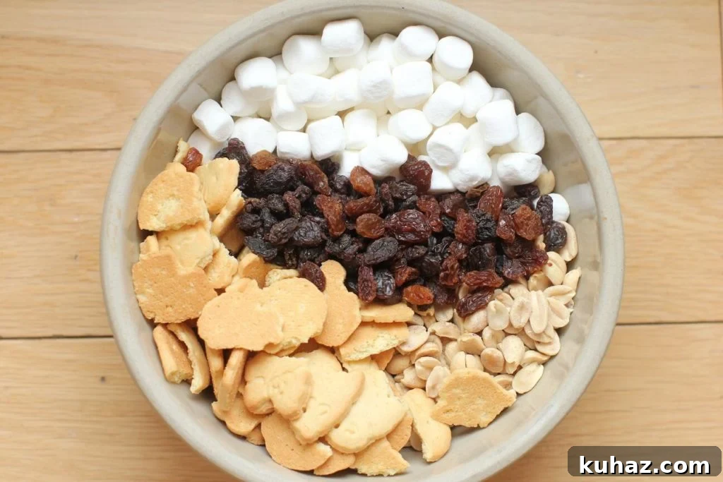 No-Bake Rocky Road Chocolate Marshmallow Bars Recipe 4 cookies, nuts, marshmallows and raisins for rocky road bars