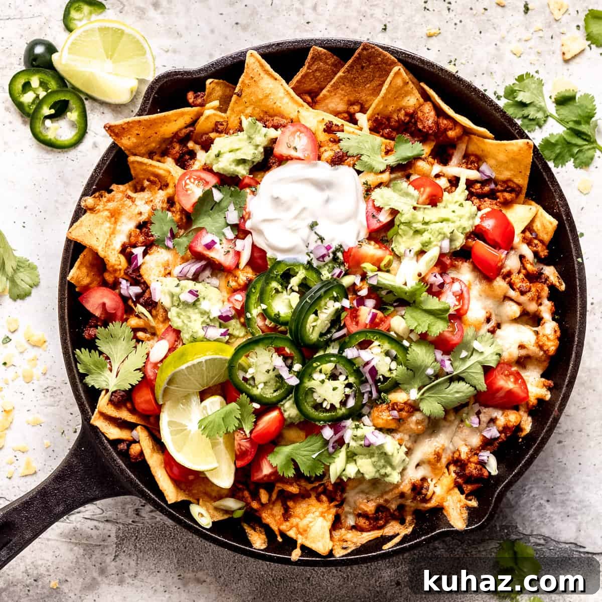 Aldi £25 Weekly Meal Plan Week 2 5 Loaded cheese nachos with chicken in a skillet