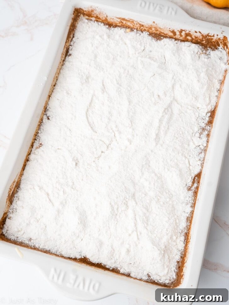 Quick Pumpkin Pie Cake with Cake Mix 5 Pumpkin pie cake batter in a cake pan before baking.