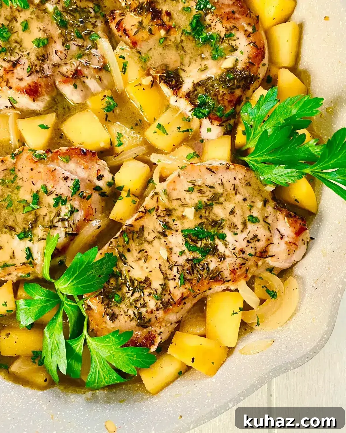 Sauté pan with pork chops.