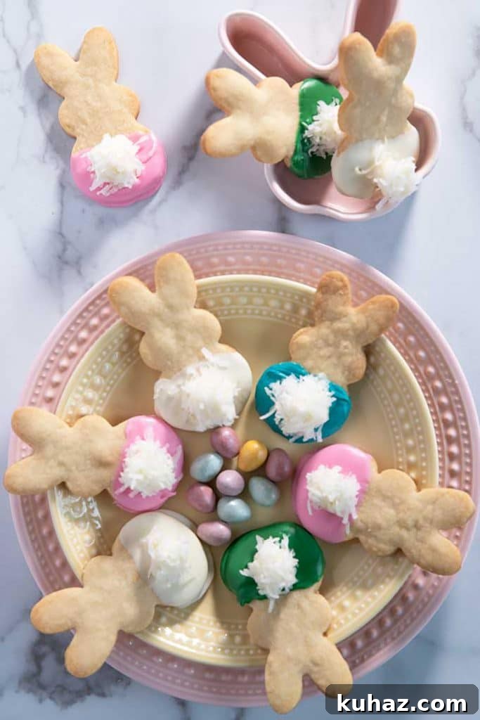 Easter Bunny Cookies with Fluffy Marshmallow Tails 4 the best and cutest Bunny Easter Cookies on a plate.