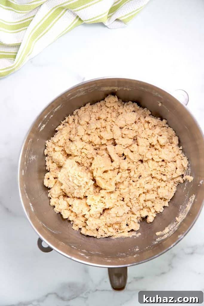 Easter Bunny Cookies with Fluffy Marshmallow Tails 9 shortbread cookie dough in a large mixing bowl