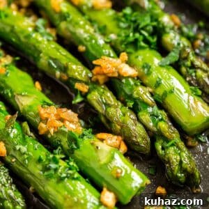 Garlic Sautéed Asparagus Recipe 12 An extreme close up of the ends and tips of skillet asparagus in a pan