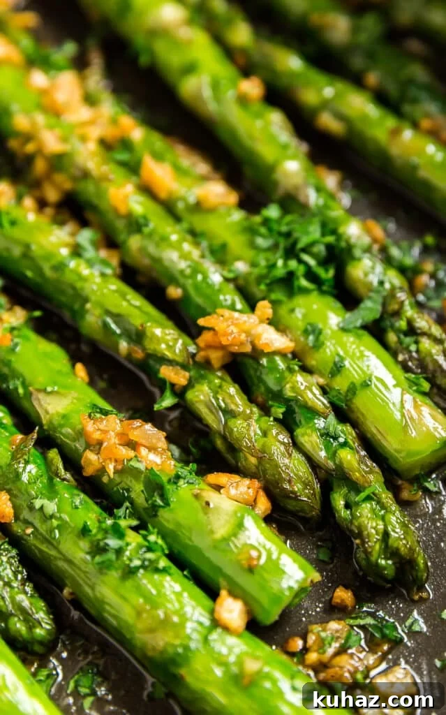 Garlic Sautéed Asparagus Recipe 7 An extreme close up of the ends and tips of skillet asparagus in a pan