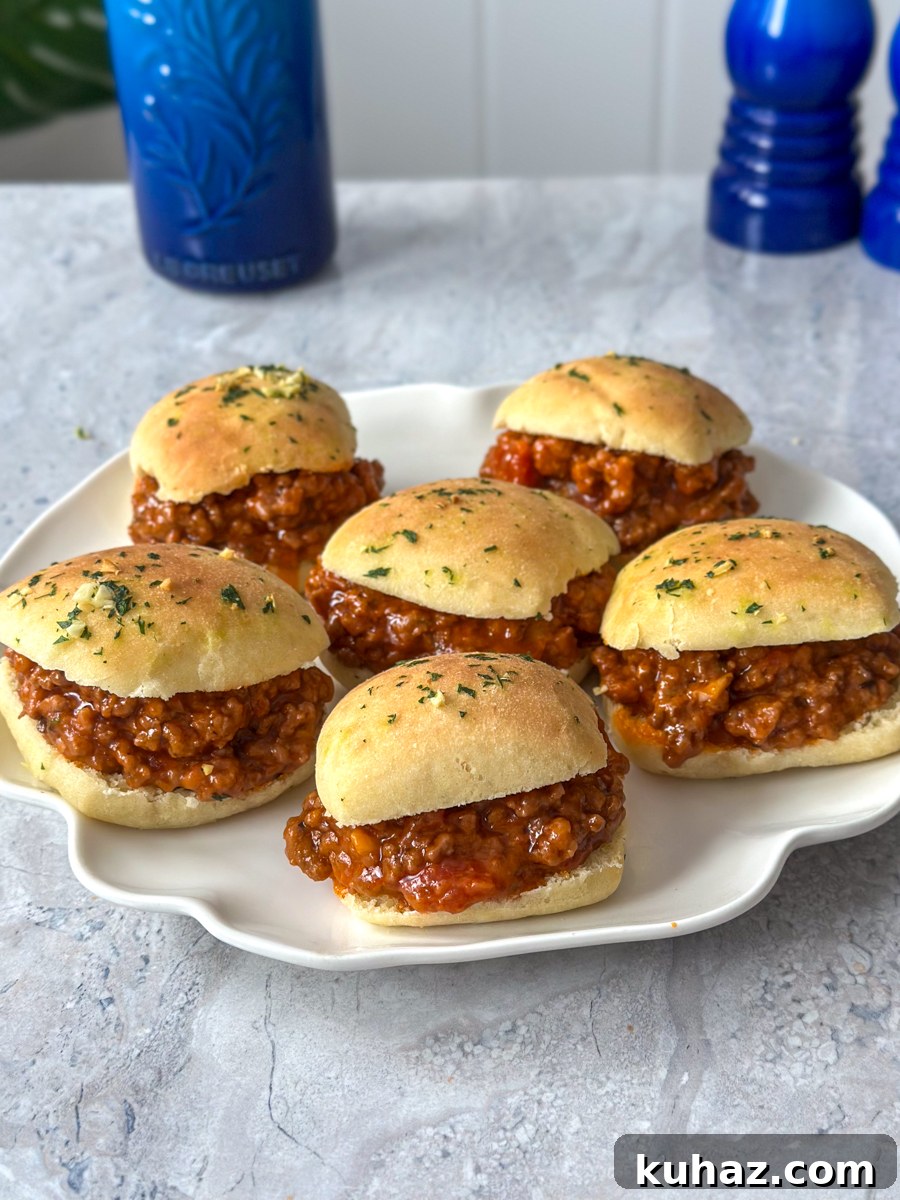 How to Make Cheesy, Savory Sloppy Joe Sliders 6 Sloppy joe sliders