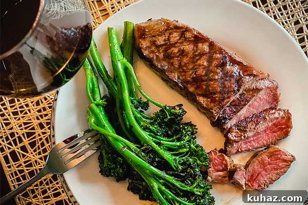 How to Grill or Roast Sweet Potatoes 4 Grilled broccolini on a plate with steak