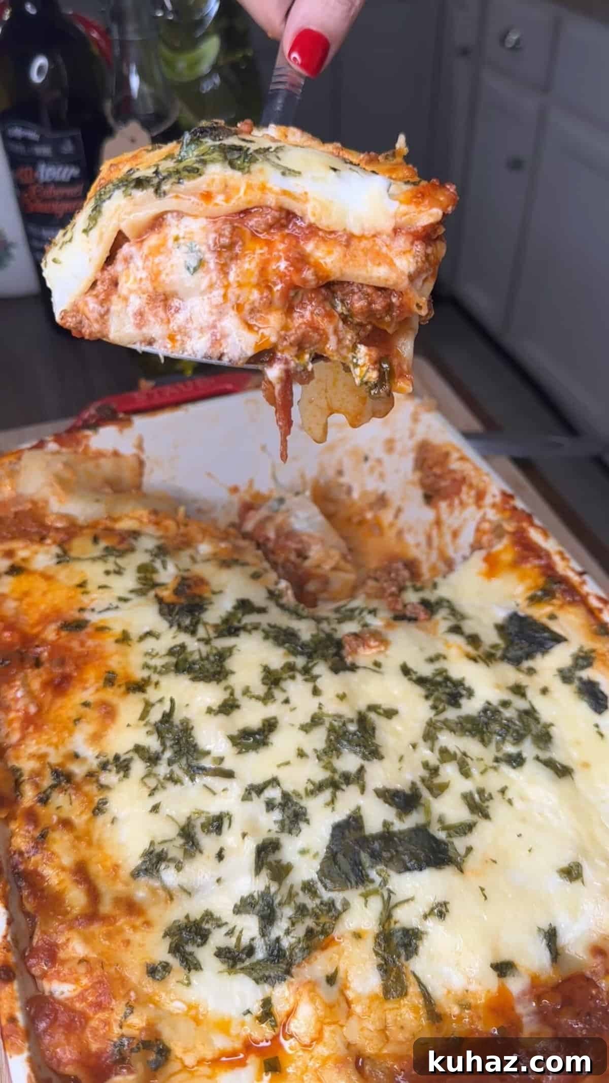 Authentic Italian Lasagna with Rich Tomato Sauce 2 Family lasagna in a red baking dish