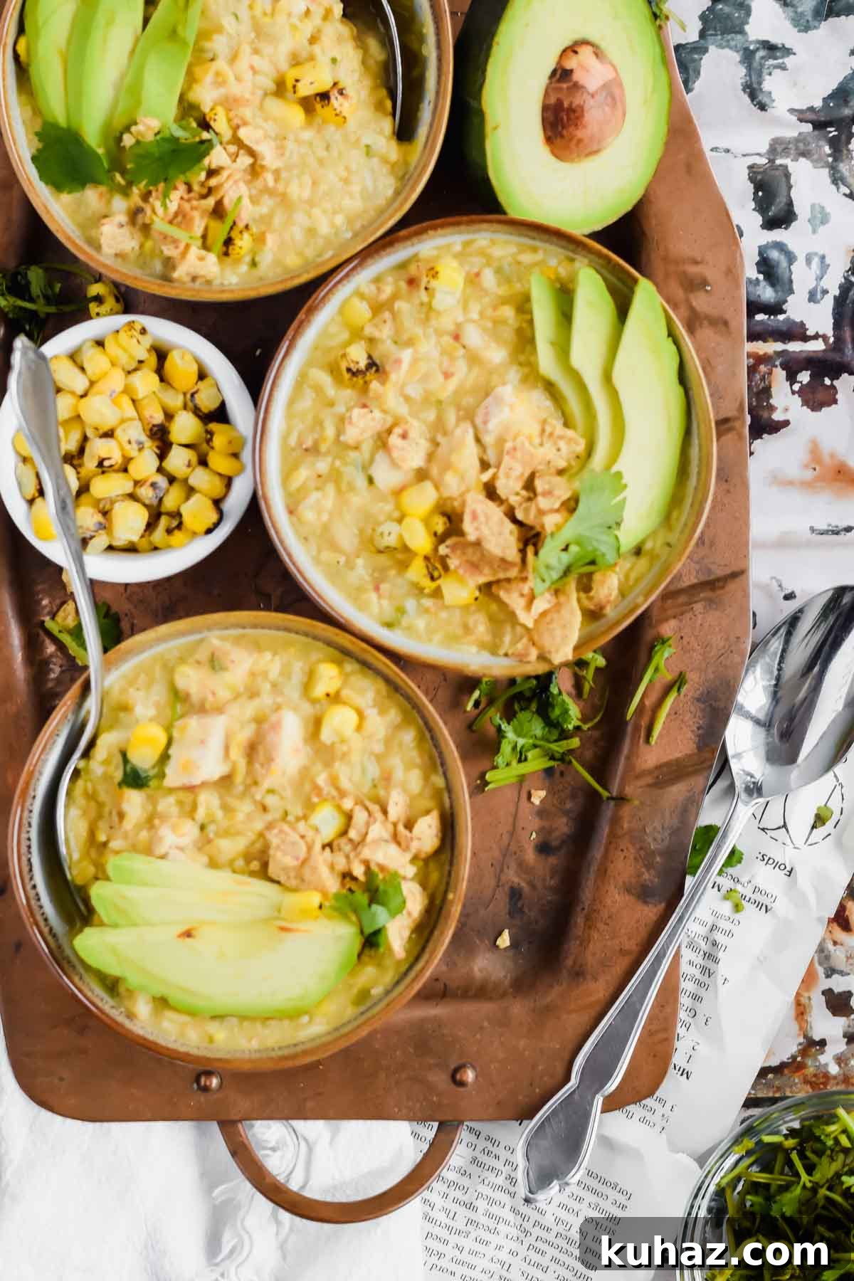 Dairy-Free White Chicken Chili Recipe 2 Three bowls of Dairy Free White Chicken Chili recipe on a metal serving tray.