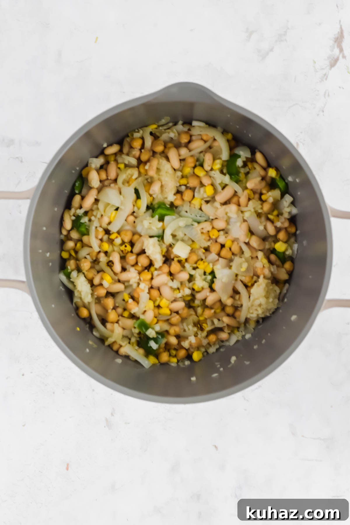 Dairy-Free White Chicken Chili Recipe 5 Ingredients for Dairy Free White Chicken Chili Recipe in a stock pot.