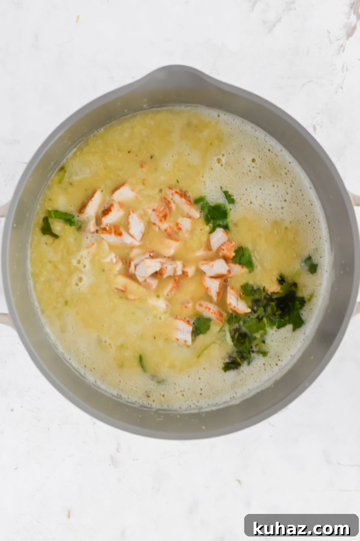 Dairy-Free White Chicken Chili Recipe 6 Dairy Free White Chicken Chili recipe cooking in a stock pot.