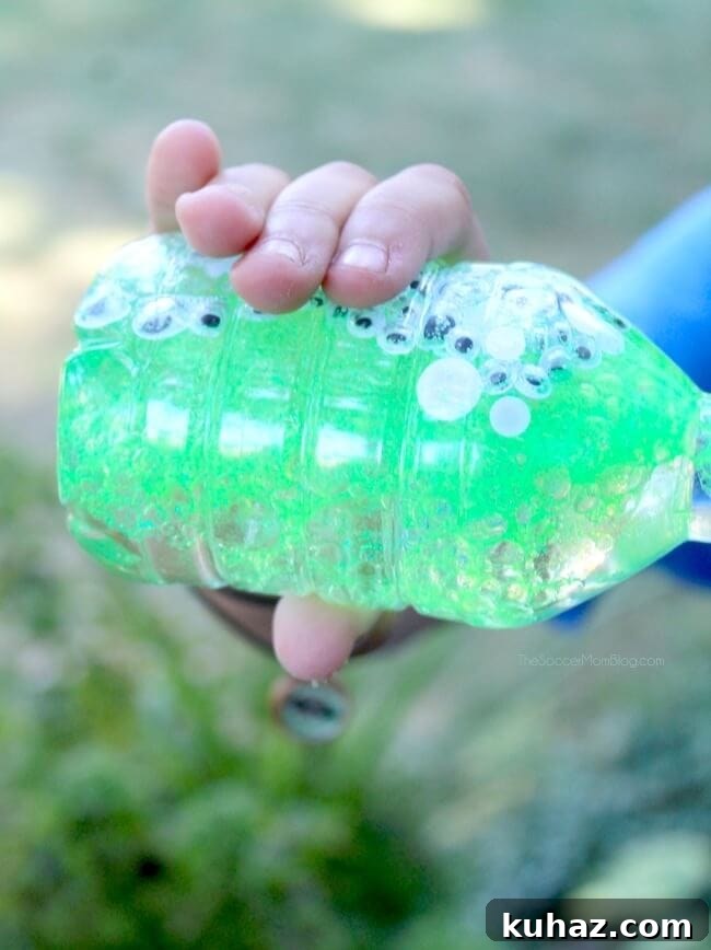 DIY Monster Eyes Sensory Bottle for Kids 7 This Monster Eyes Sensory Bottle is a sparkly and spooky Halloween kids craft and calm-down tool.