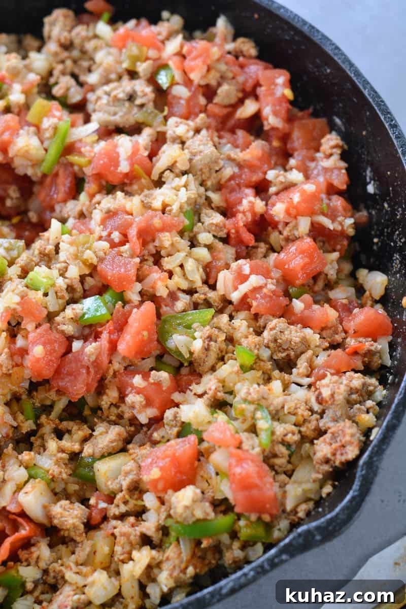 This low carb Keto Taco Casserole is loaded with seasoned ground beef, vegetables and loads of cheese!