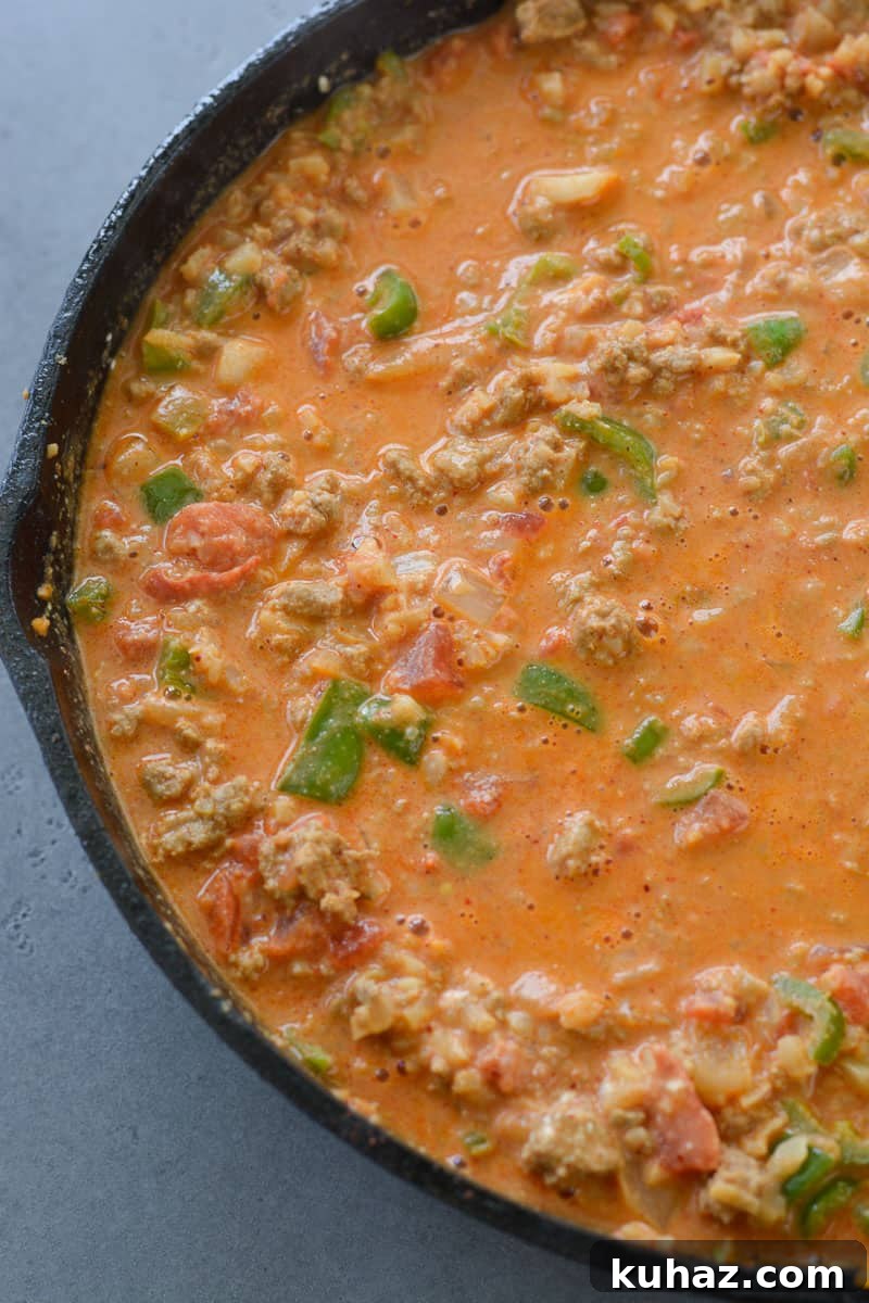 This low carb Keto Taco Casserole is loaded with seasoned ground beef, vegetables and loads of cheese!