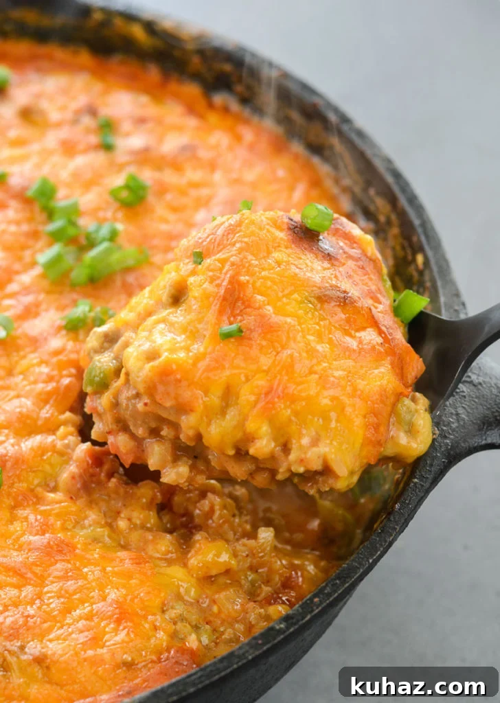 This low carb Keto Taco Casserole is loaded with seasoned ground beef, vegetables and loads of cheese!