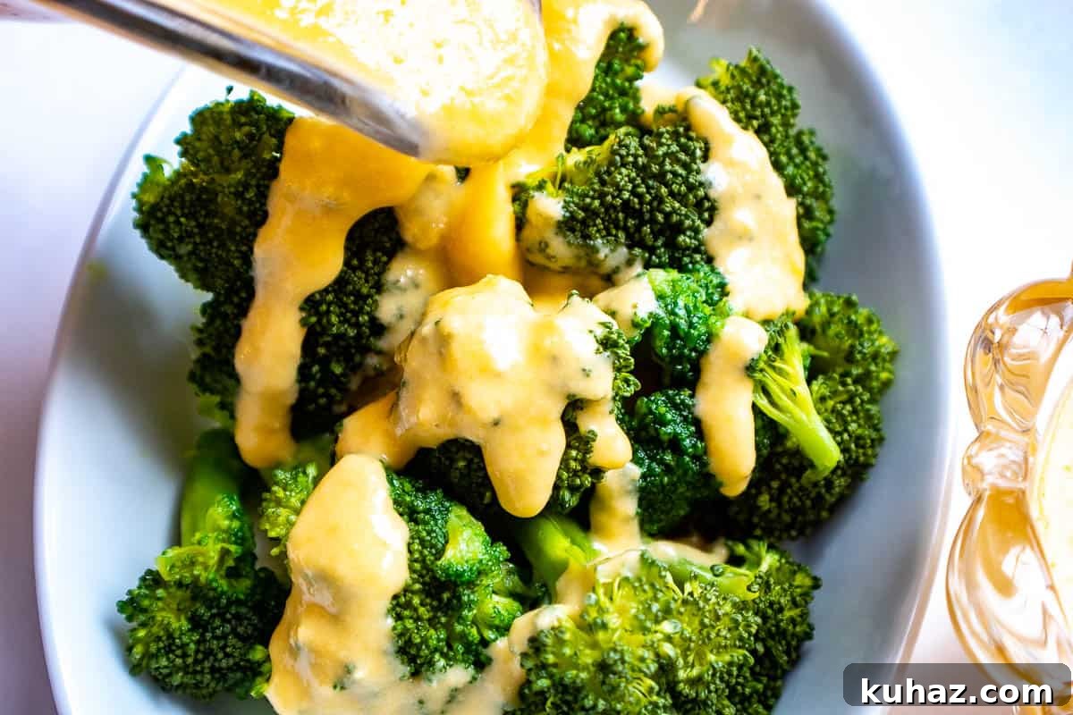 Perfect Mornay Sauce Recipe for Creamy Cheese Sauce 4 Cheddar cheese sauce drizzled over broccoli