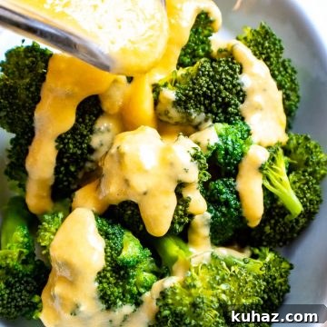 Perfect Mornay Sauce Recipe for Creamy Cheese Sauce 5 Cheddar cheese sauce drizzled over broccoli