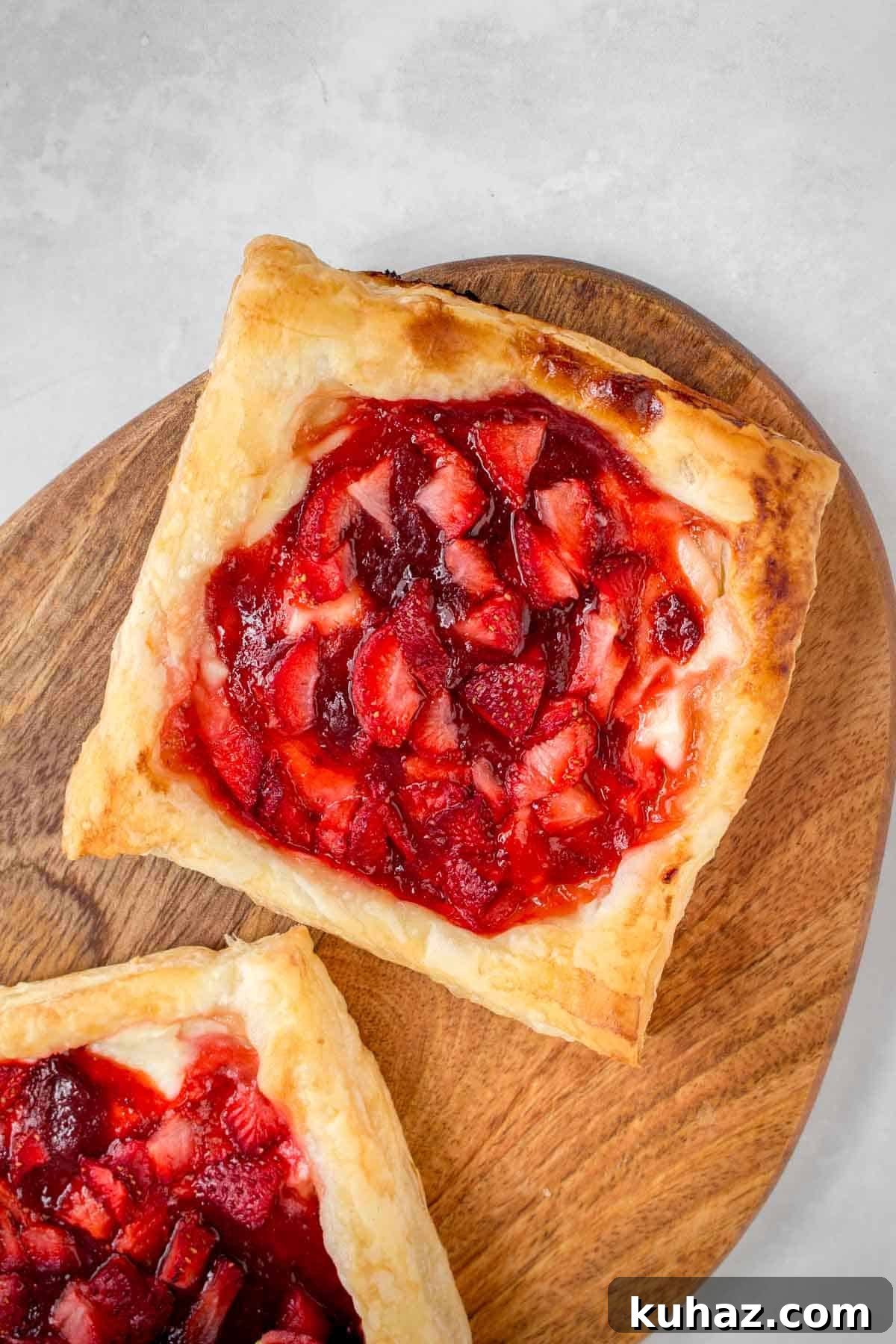 Flaky Homemade Strawberry Danish with Cream Cheese Recipe 9 Overhead view of a strawberry cream cheese danish.