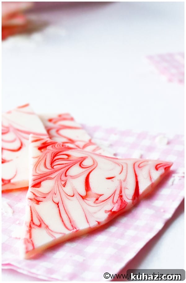 Homemade White Chocolate Peppermint Bark on Pink Napkin