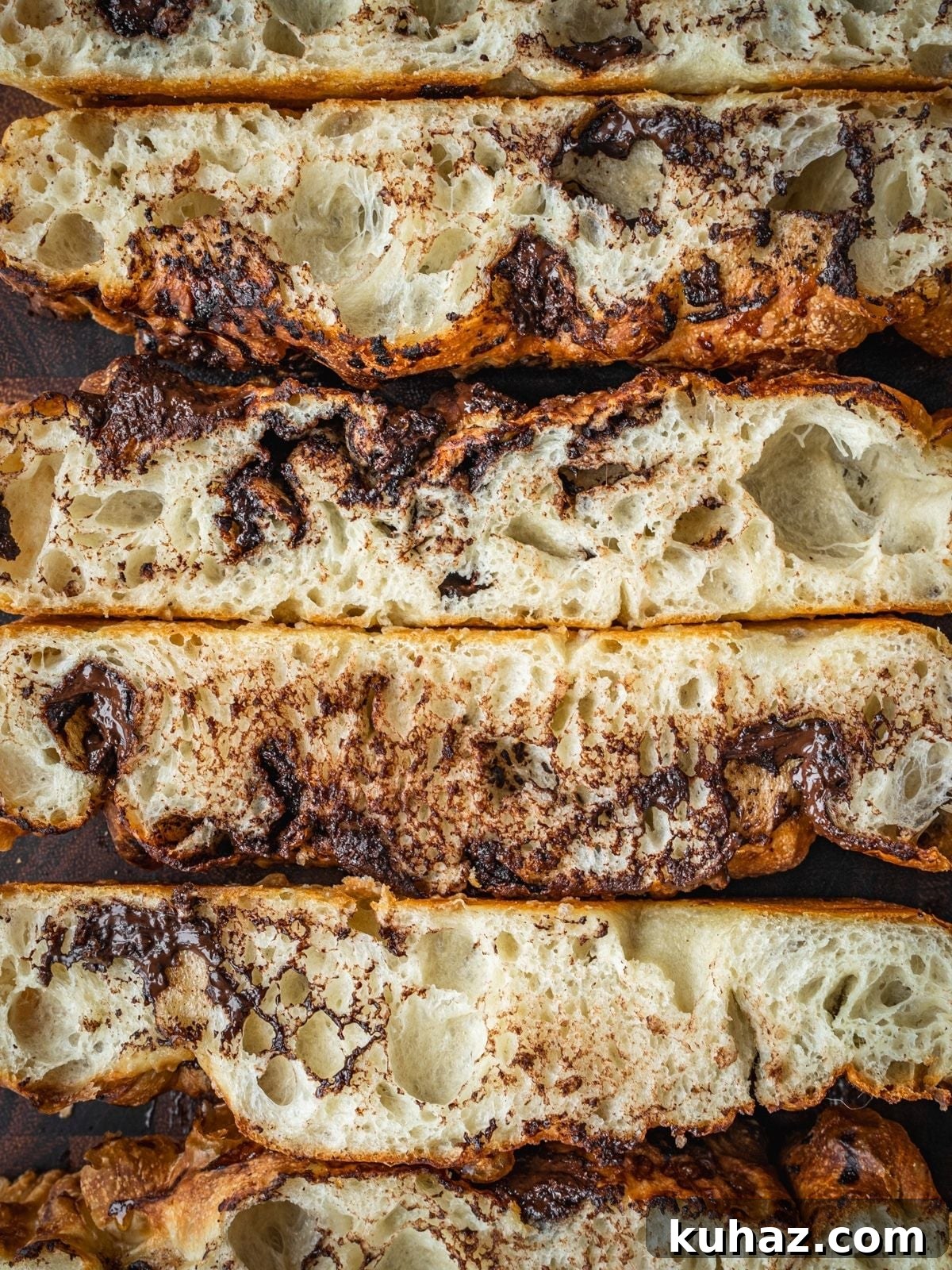 Chocolate Focaccia Recipe with Same Day Dough and Video 2 Chocolate Focaccia slices on a wooden cutting board.