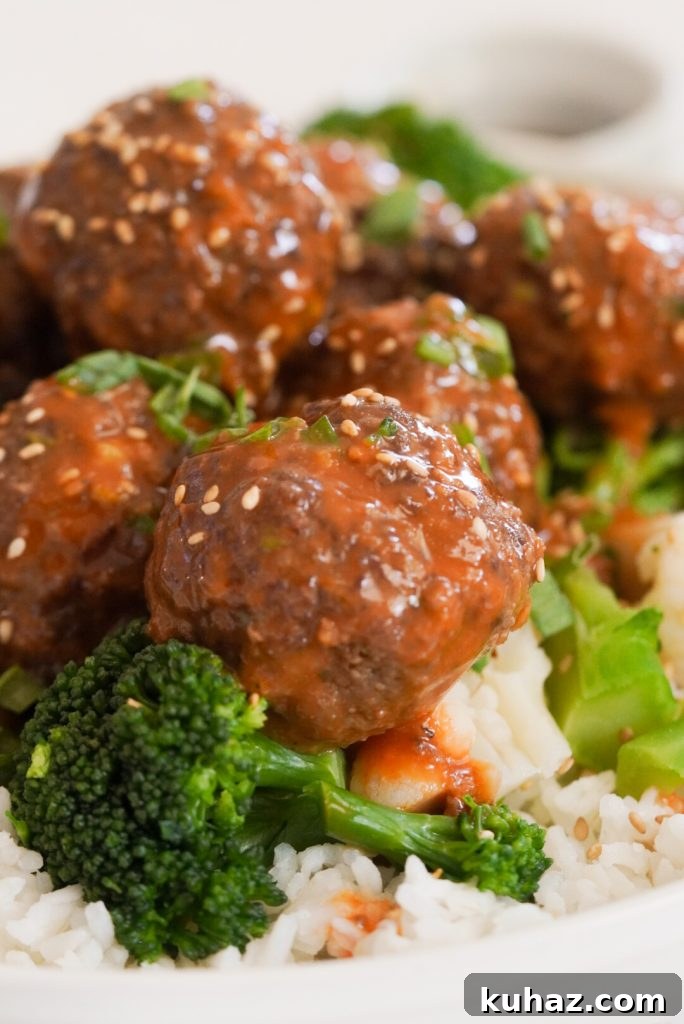 Spicy Firecracker Meatballs Recipe with Sweet Chili Glaze 3 beef meatballs with spicy firecracker sauce and broccoli.