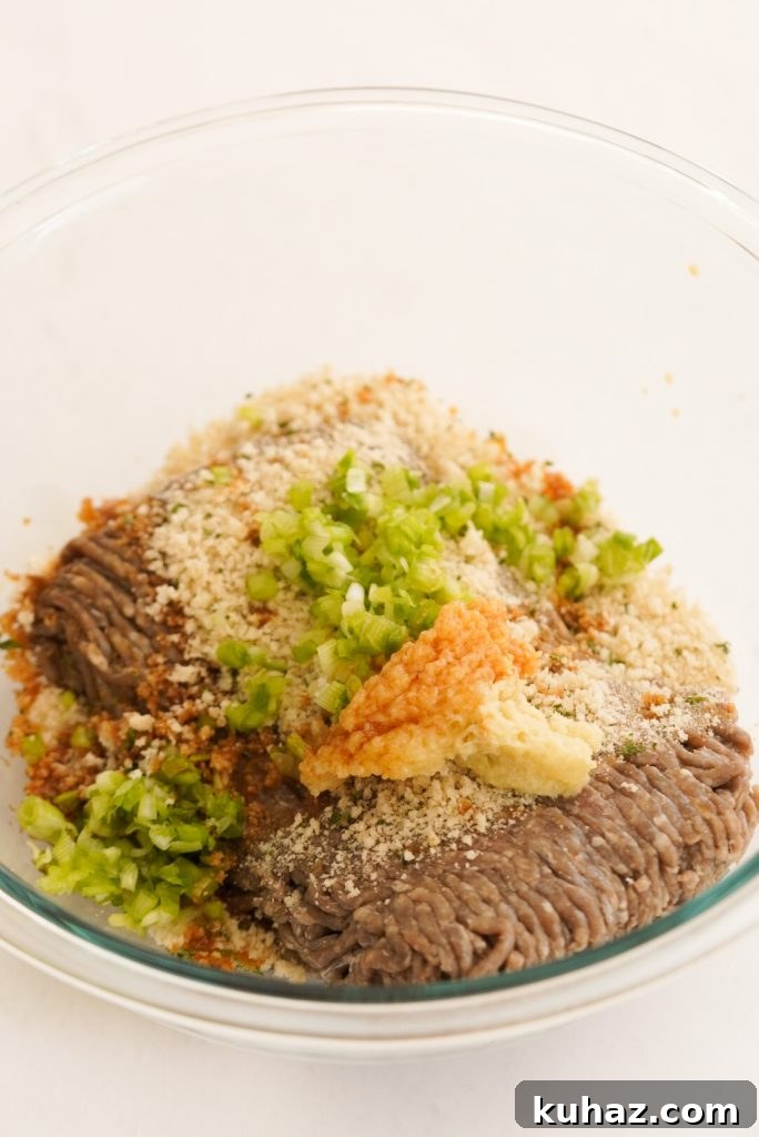 Spicy Firecracker Meatballs Recipe with Sweet Chili Glaze 6 process shot of all the firecracker meatball ingredients in a mixing bowl.