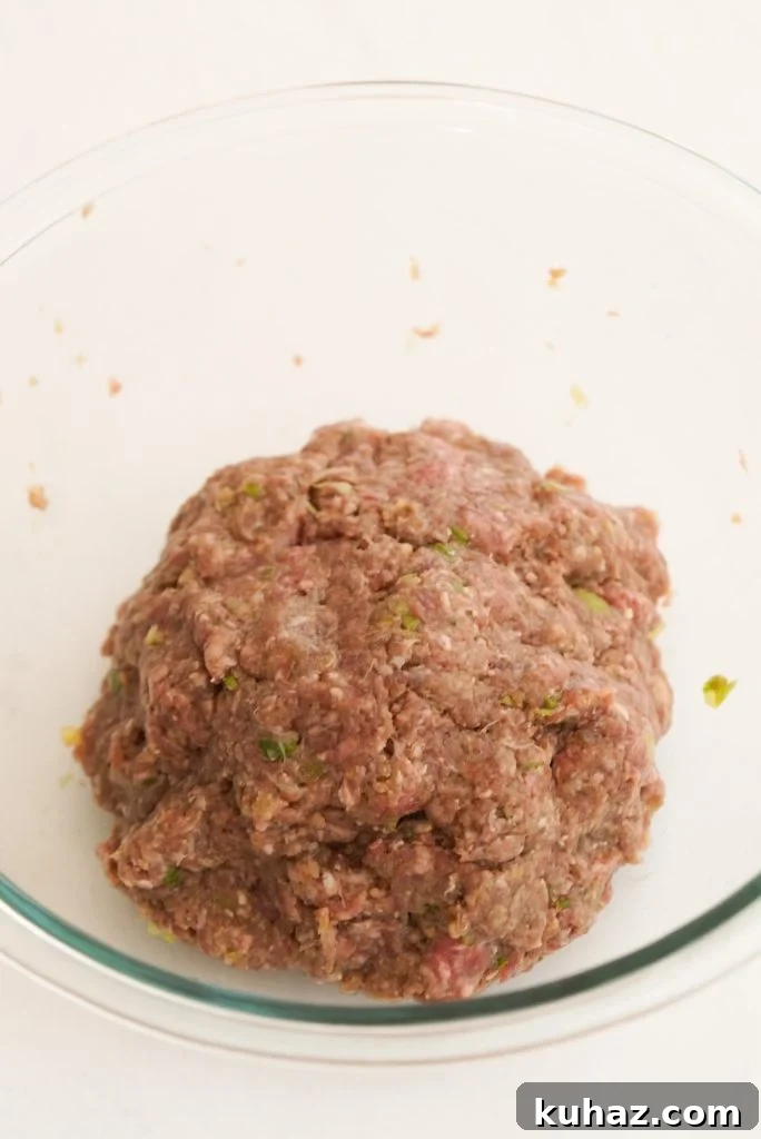 Spicy Firecracker Meatballs Recipe with Sweet Chili Glaze 7 firecracker meatball mixture after mixing to combine.