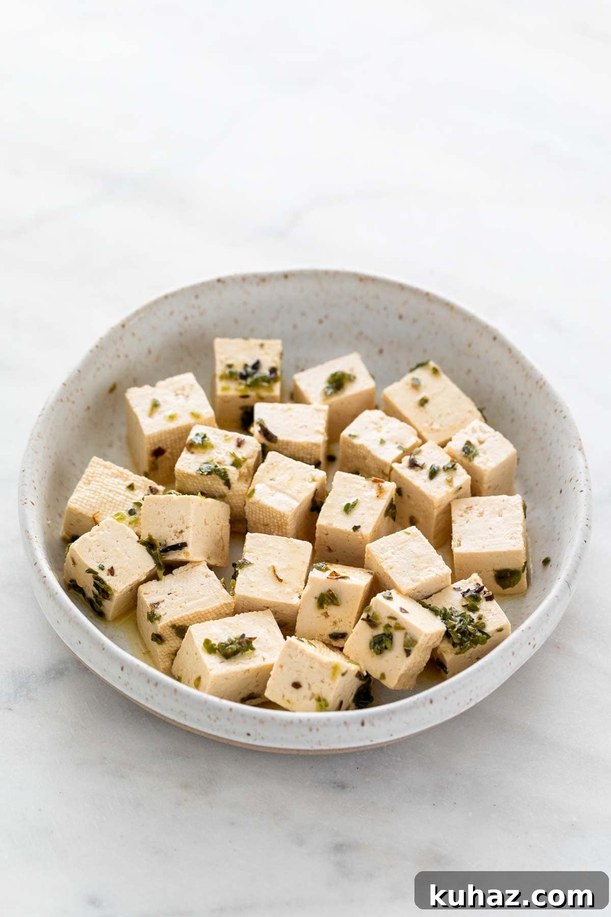 Homemade Vegan Feta Cheese Recipe 2 Vegan feta cheese in a dish.