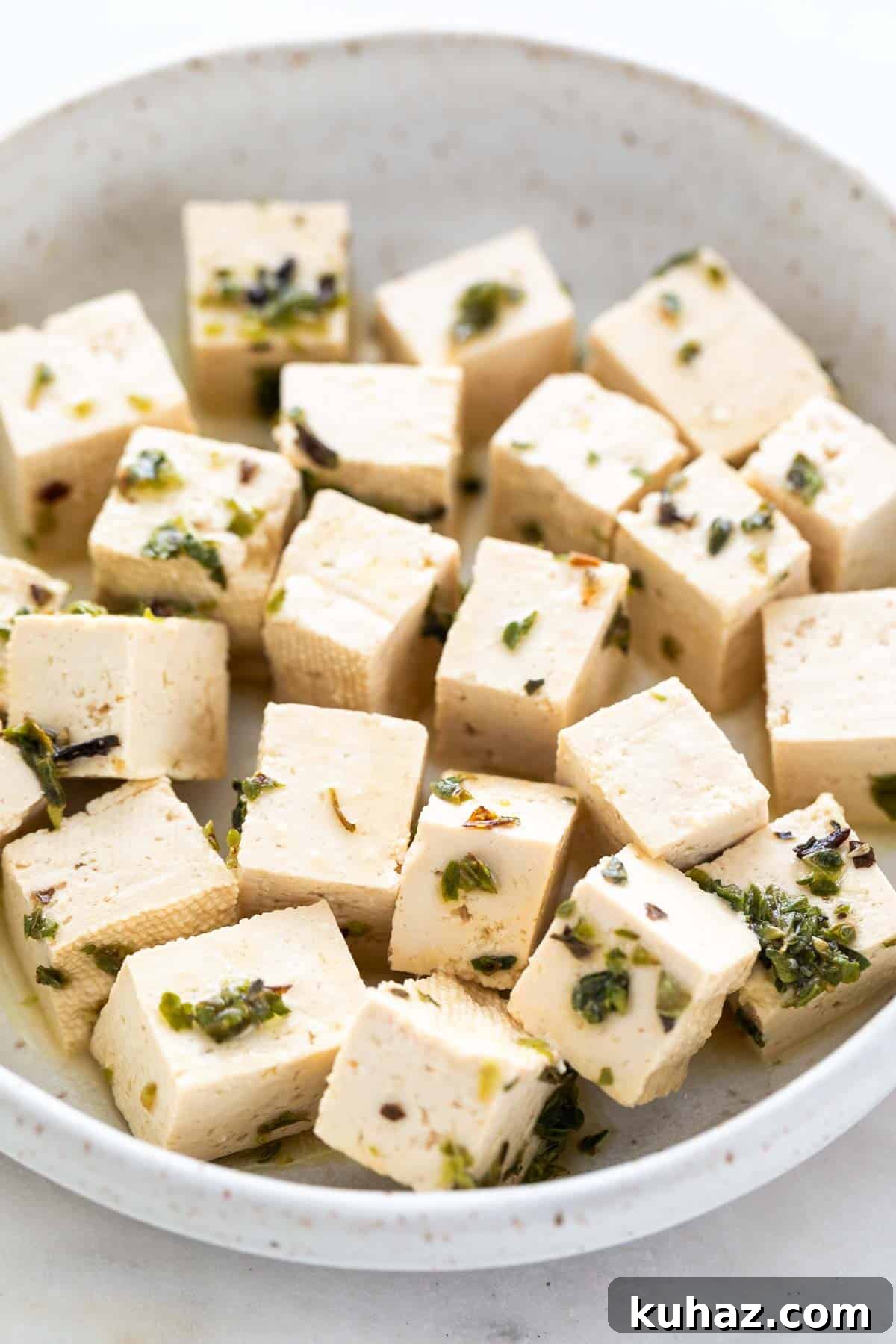 Homemade Vegan Feta Cheese Recipe 8 Tofu feta cheese in a dish.