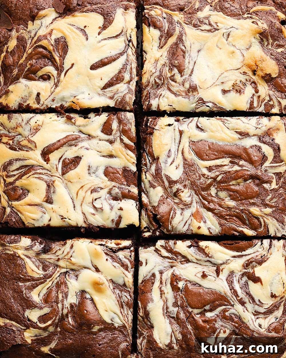 14 Crowd-Pleasing Game Day Appetizers 15 Six cheesecake swirl brownies with a marble-like pattern.