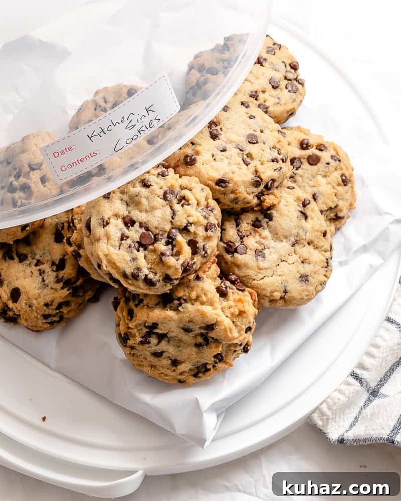 Loaded Kitchen Sink Cookies Recipe with Chocolate, Oats & Nuts 11 completed Kitchen Sink Cookies in storage container
