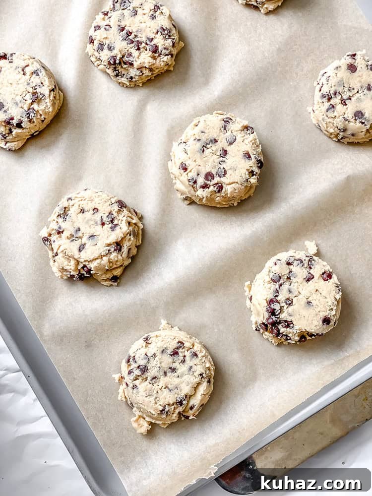 Loaded Kitchen Sink Cookies Recipe with Chocolate, Oats & Nuts 9 process shot showing cookies on baking sheet