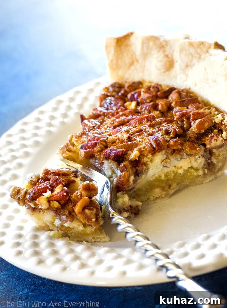 Creamy Pecan Cheesecake Pie Recipe with Buttery Crust 3 Pecan Cheesecake Pie slice