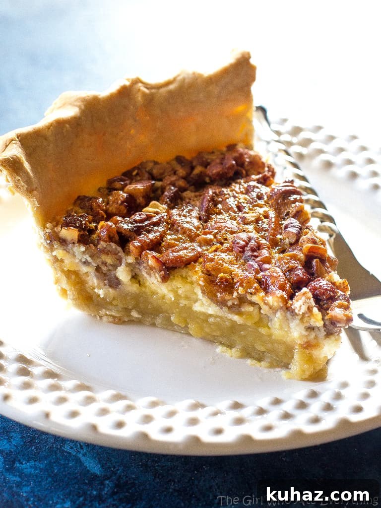 Creamy Pecan Cheesecake Pie Recipe with Buttery Crust 4 Pecan Cheesecake Pie slice