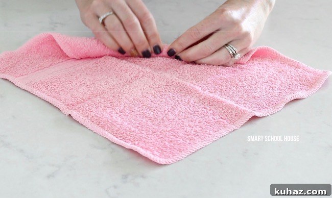 Make an Adorable Washcloth Bunny: Step-by-Step Folding Tutorial 4 How to make wash cloth bunnies. Also called boo boo bunnies. Good baby shower idea too!