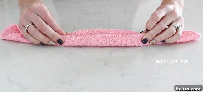 Make an Adorable Washcloth Bunny: Step-by-Step Folding Tutorial 6 How to make wash cloth bunnies. Also called boo boo bunnies. Good baby shower idea too!
