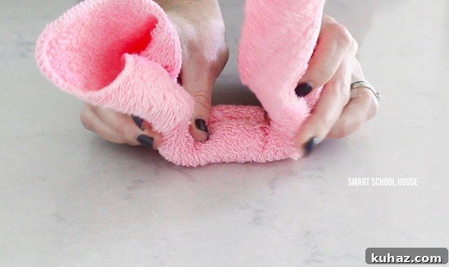 Make an Adorable Washcloth Bunny: Step-by-Step Folding Tutorial 7 How to make wash cloth bunnies. Also called boo boo bunnies. Good baby shower idea too!