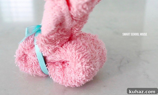 Make an Adorable Washcloth Bunny: Step-by-Step Folding Tutorial 9 How to make wash cloth bunnies. Also called boo boo bunnies. Good baby shower idea too!