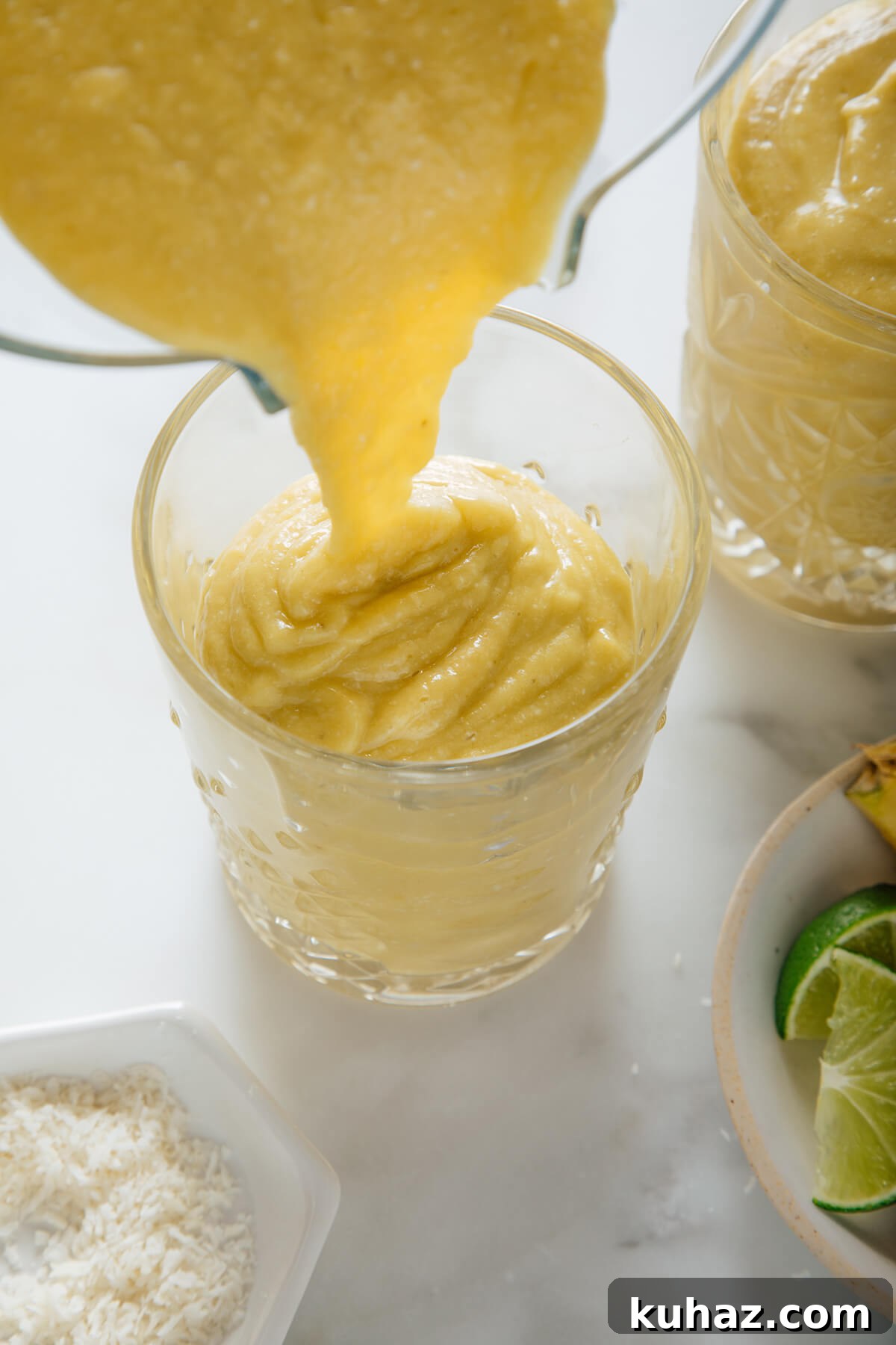 Creamy Pineapple Avocado Smoothie Recipe 6 pouring pineapple avocado smoothie