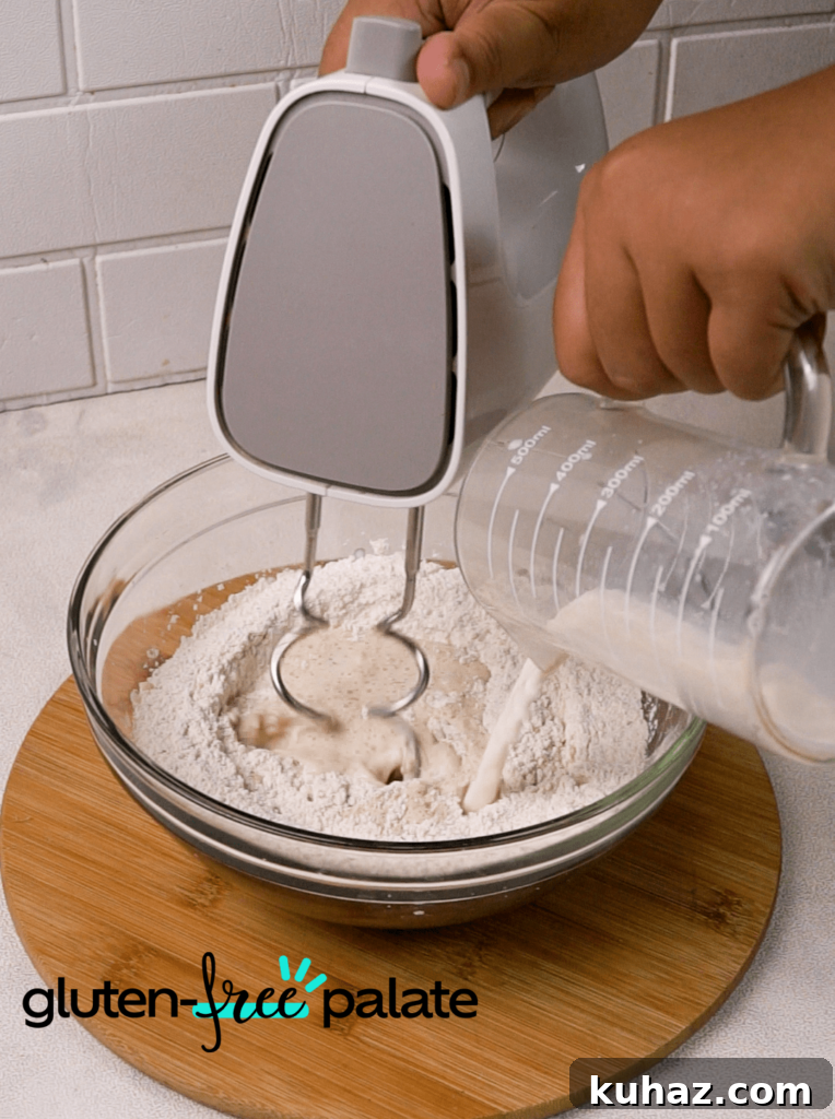 Soft and Chewy Gluten-Free Bagels Recipe 7 Use an electric hand mixer to mix everything together.
